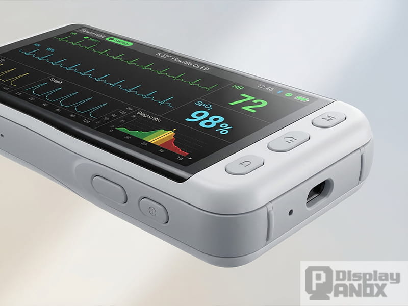 Close-up of a portable medical diagnostic device using a 6.52 inch flexible OLED display